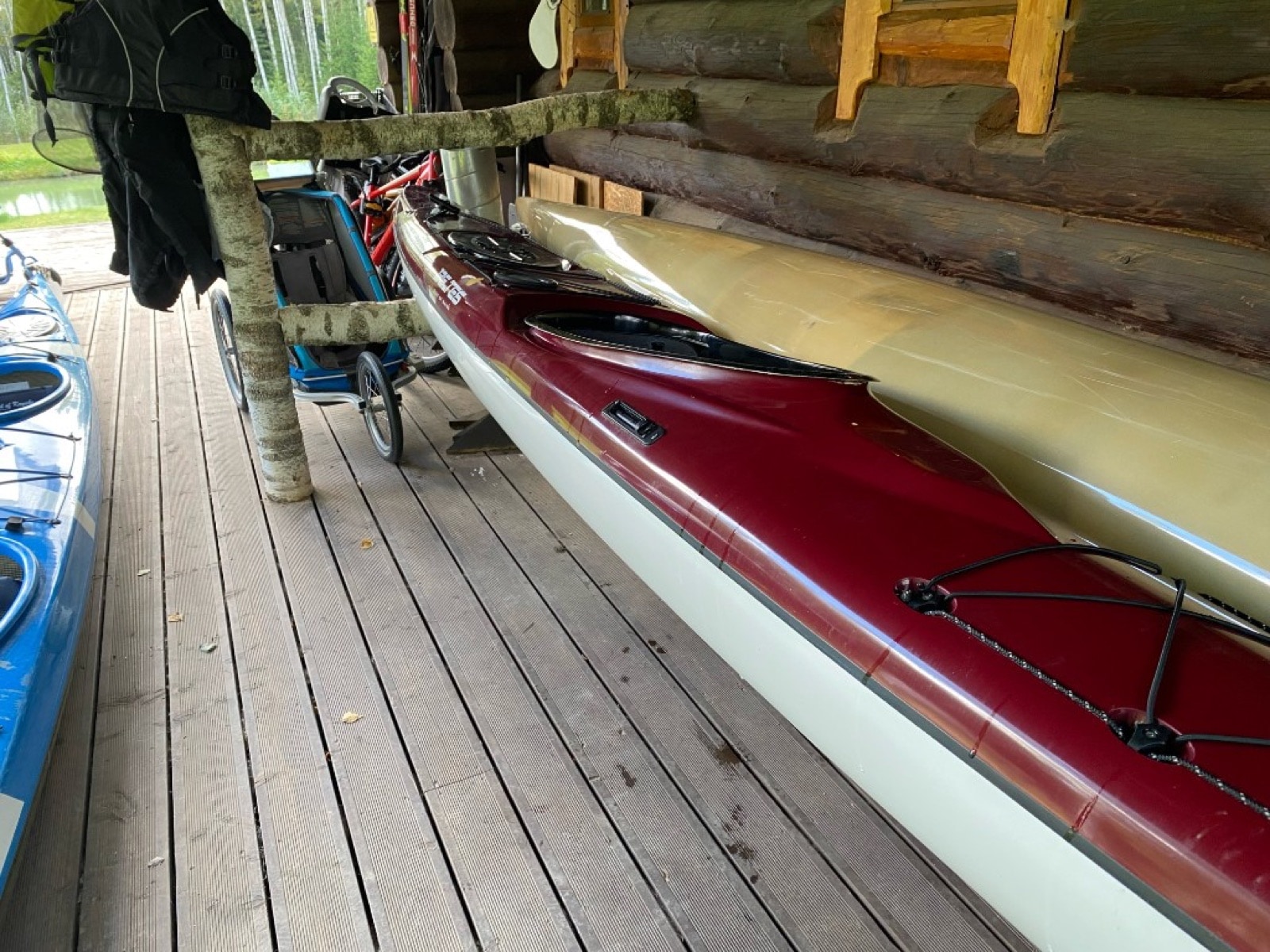 Beltes wide touring kayak used — side with branding